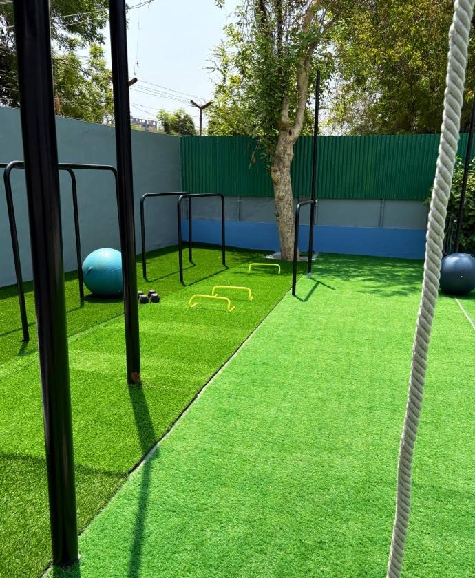 Turf floor, pull-up rigs, rings & mobility tools